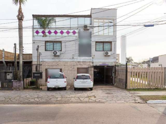 Ótima oportunidade ! Prédio misto(Residencial / Comercial) á venda na Eduardo Prado , bairro Cavalhada.&lt;BR&gt;Ótimo apartamento com 3 dormitórios, living 2 ambientes, 2 banheiros, cozinha , area de