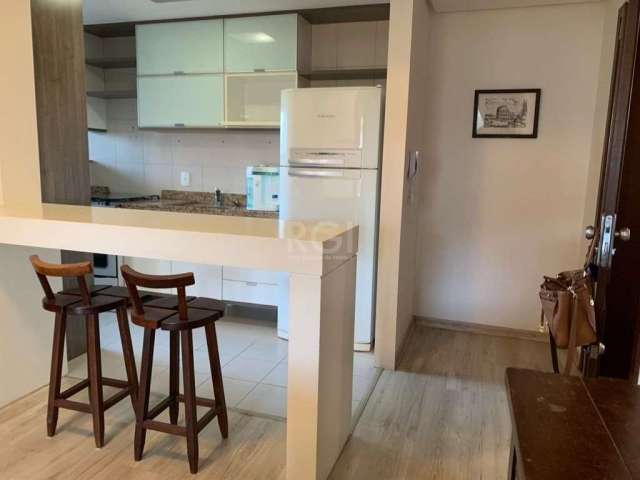 Vende-se apartamento em excelente localização no bairro rio branco . São 02 dormitórios, sendo 01 suíte. Living em 2 ambientes e sacada integrada com amplas aberturas e churrasqueira. Cozinha american