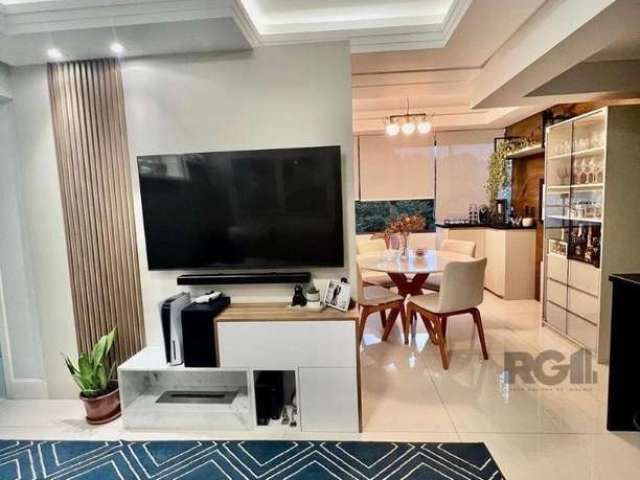 Vende-se apartamento semi mobiliado, no Bairro Cristo Redentor, com vista definida, 3 dormitórios com suíte, 2 vagas, living amplo com cozinha americana integrada com churrasqueira, área de serviço se