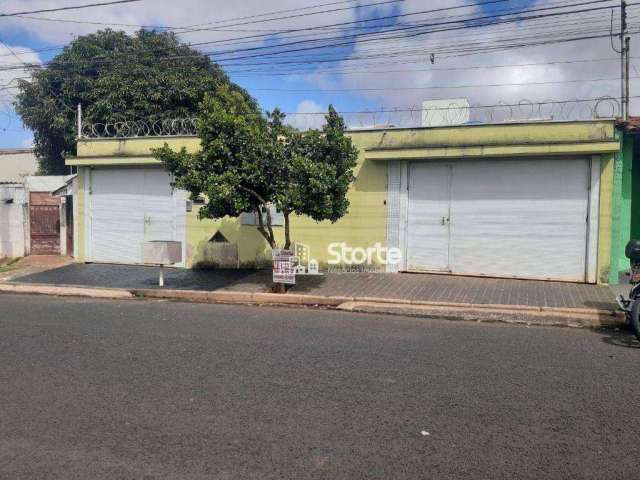 Terreno com 3 casas à venda, 320 m² por R$ 680.000 - Tibery - Uberlândia/MG