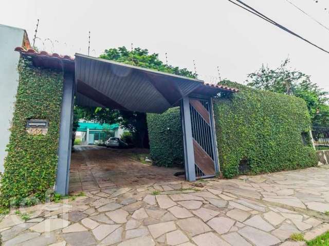 Casa com 5 quartos à venda na Rua Jacundá, 144, Guarujá, Porto Alegre, 400 m2 por R$ 850.000