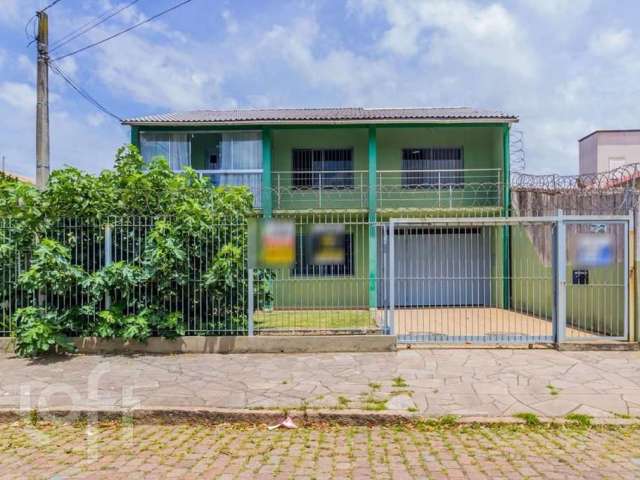 Casa com 5 quartos à venda na Rua Luiz de Campos, 72, Sarandi, Porto Alegre, 270 m2 por R$ 649.000