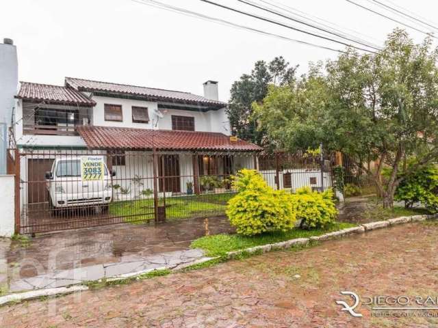 Casa com 4 quartos à venda na Rua Waldomiro Schapke, 311, Partenon, Porto Alegre, 260 m2 por R$ 803.225