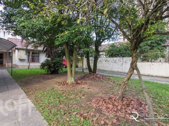 Casa com 5 quartos à venda na Rua Professor Guerreiro Lima, 1032, Partenon, Porto Alegre, 172 m2 por R$ 750.000