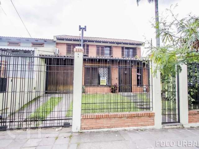 Casa com 6 quartos à venda na Rua Professor Pedro Santa Helena, 255, Jardim do Salso, Porto Alegre, 300 m2 por R$ 850.000