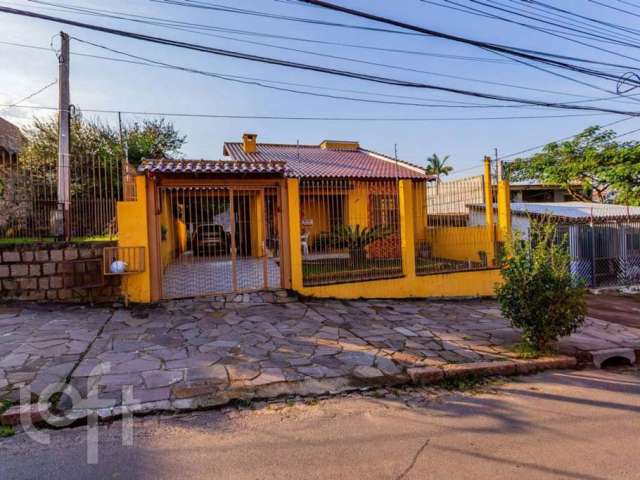 Casa com 3 quartos à venda na Avenida Delmar Rocha Barbosa, 699, Rubem Berta, Porto Alegre, 103 m2 por R$ 650.000