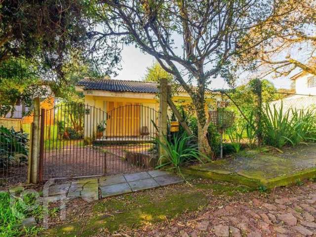 Casa com 4 quartos à venda na Rua Hygino Russi Lima, 290, Ponta Grossa, Porto Alegre, 150 m2 por R$ 290.000