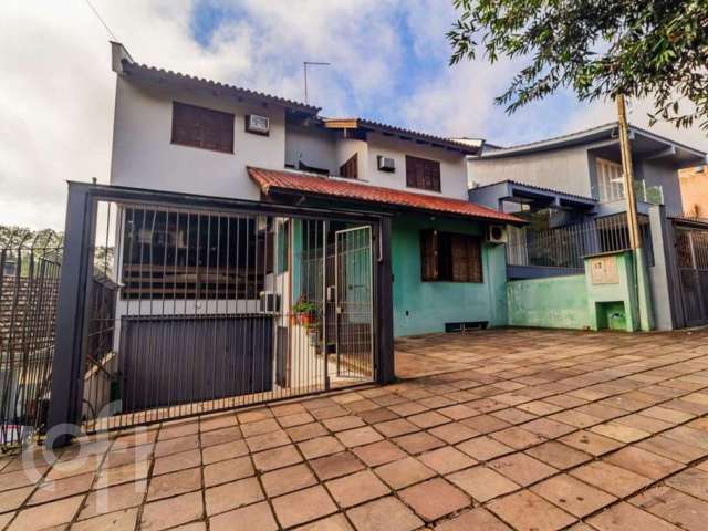 Casa com 5 quartos à venda na Rua Araponga, 387, Chácara das Pedras, Porto Alegre, 335 m2 por R$ 1.490.000