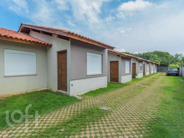 Casa em condomínio fechado com 2 quartos à venda na Rua Santa Mônica, 404, Ponta Grossa, Porto Alegre, 47 m2 por R$ 205.000