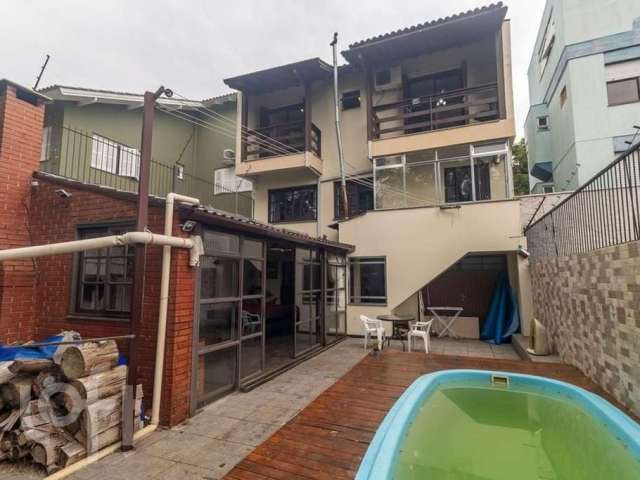 Casa com 4 quartos à venda na Rua Joaquim Cruz, 30, Santo Antônio, Porto Alegre, 256 m2 por R$ 1.150.000