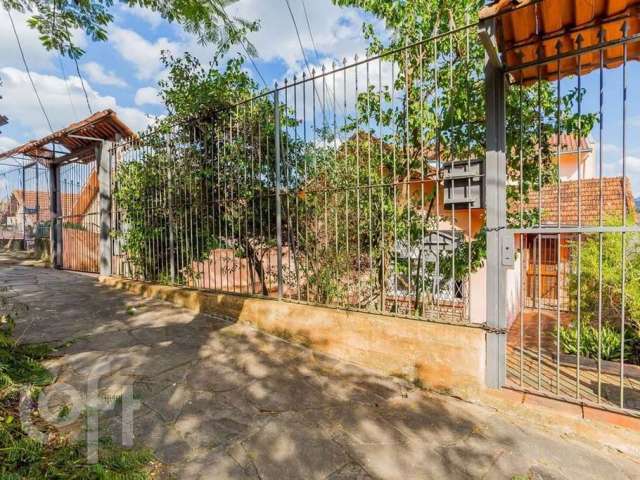 Casa com 6 quartos à venda na Rua Professor Abílio Azambuja, 95, Jardim do Salso, Porto Alegre, 256 m2 por R$ 900.000