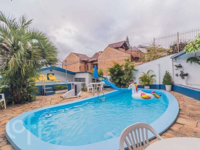 Casa com 4 quartos à venda na Santo Camaratta-Santino, 6, Rubem Berta, Porto Alegre, 176 m2 por R$ 795.000