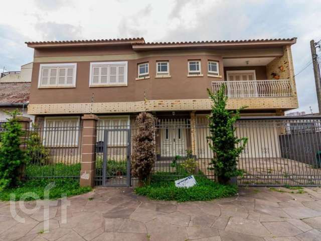 Casa com 4 quartos à venda na Rua Ari Marinho, 187, Higienópolis, Porto Alegre, 285 m2 por R$ 1.225.000