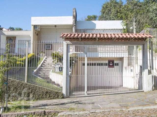 Casa com 3 quartos à venda na Rua Landel de Moura, 1435, Tristeza, Porto Alegre, 180 m2 por R$ 1.390.000