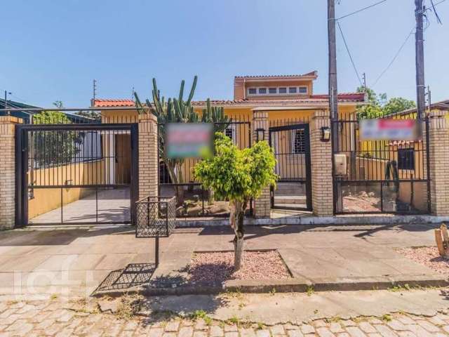 Casa com 3 quartos à venda na Rua Carmense, 165, Rubem Berta, Porto Alegre, 218 m2 por R$ 650.000