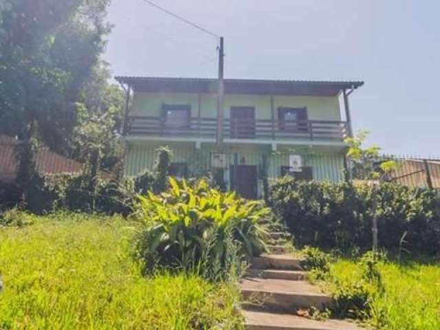 Casa com 3 quartos à venda na Estrada Costa Gama, 668, Belém Velho, Porto Alegre, 200 m2 por R$ 490.000