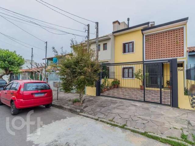 Casa com 3 quartos à venda na Rua Eva Pinto, 114, Hípica, Porto Alegre, 91 m2 por R$ 550.000