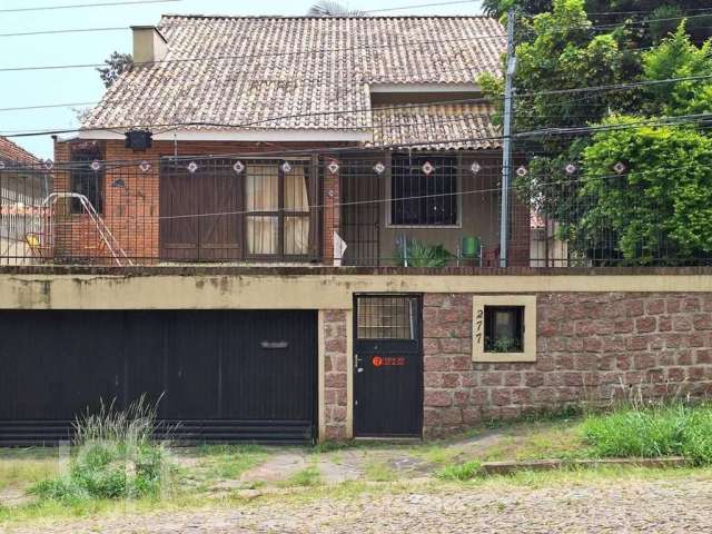 Casa com 3 quartos à venda na Avenida Deputado Aramy Silva, 277, Santa Tereza, Porto Alegre, 154 m2 por R$ 945.000