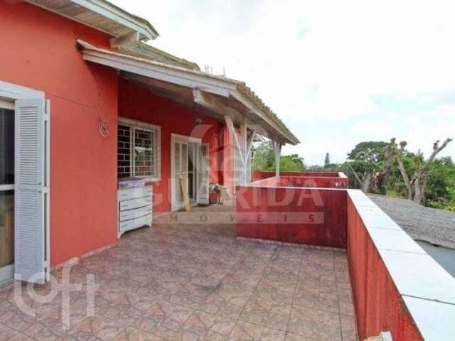 Casa com 4 quartos à venda na Avenida Cinco de Novembro, 346, Teresópolis, Porto Alegre, 180 m2 por R$ 490.000