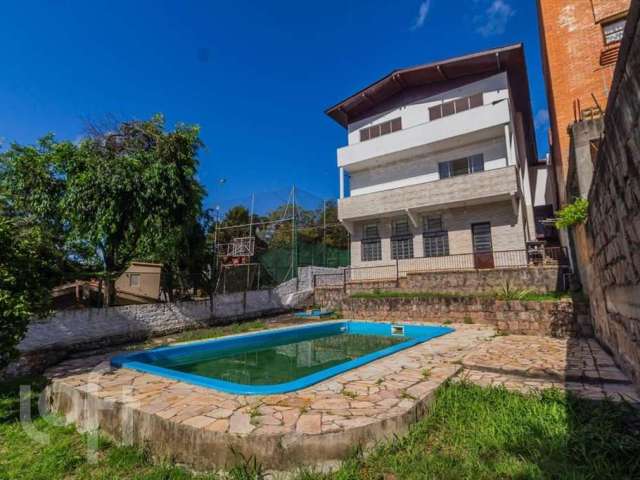 Casa com 4 quartos à venda na Praça São Caetano, 84, Teresópolis, Porto Alegre, 432 m2 por R$ 1.510.500