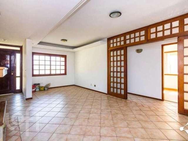 Casa com 4 quartos à venda na Rua Augusto Comte, 45, Cavalhada, Porto Alegre, 228 m2 por R$ 1.240.000