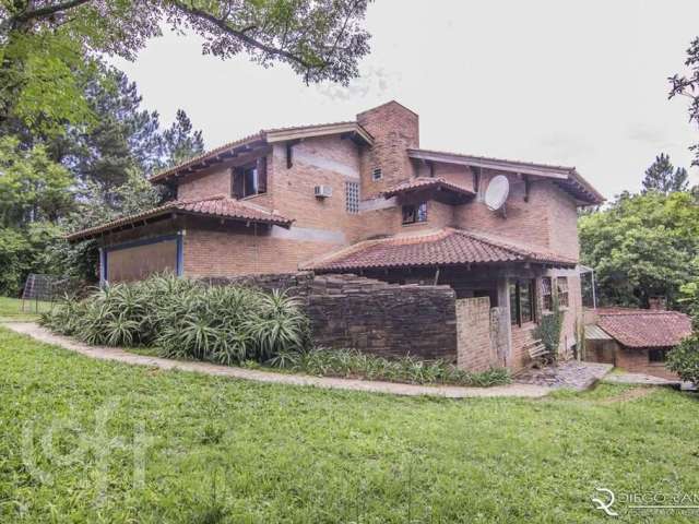 Casa com 3 quartos à venda na Estrada Júlio Antônio Pereira, 180, Hípica, Porto Alegre, 500 m2 por R$ 1.900.000