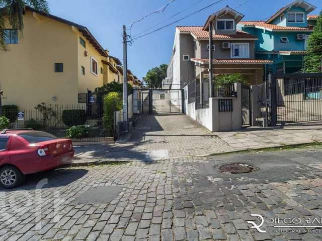 Casa em condomínio fechado com 3 quartos à venda na Rua Padre João Batista Reus, 2133, Camaquã, Porto Alegre, 152 m2 por R$ 470.000