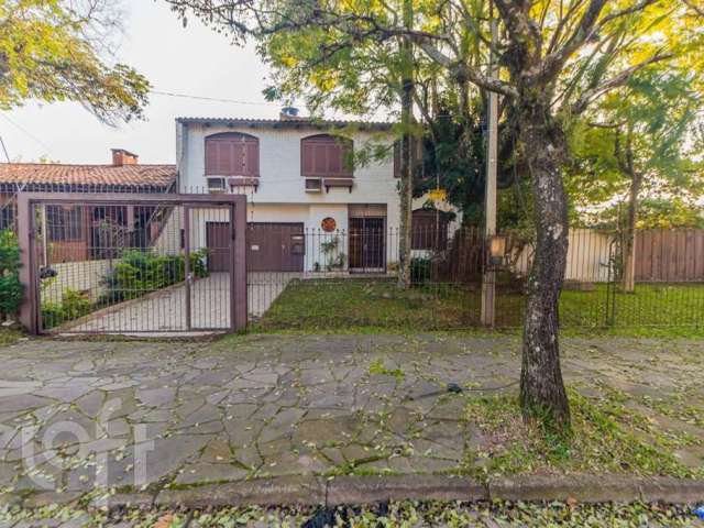 Casa com 3 quartos à venda na Rua Comandai, 541, Cristal, Porto Alegre, 1155 m2 por R$ 840.000