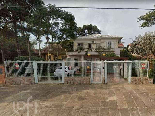 Casa com 4 quartos à venda na Avenida Guaíba, Ipanema, Porto Alegre, 301 m2 por R$ 1.980.000