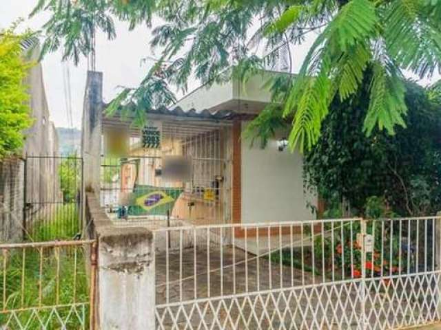 Casa com 4 quartos à venda na Octávio de Souza, 556, Nonoai, Porto Alegre, 216 m2 por R$ 640.000