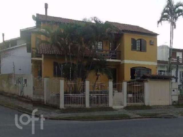 Casa com 3 quartos à venda na Avenida Celestino Bertolucci, 115, Hípica, Porto Alegre, 306 m2 por R$ 979.900