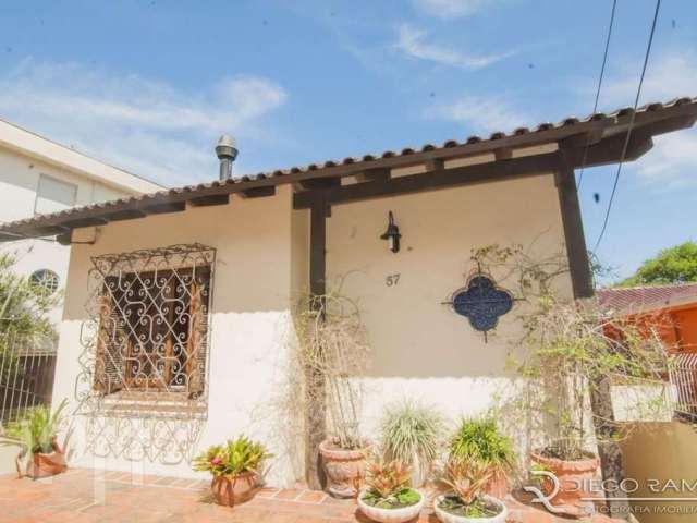 Casa com 3 quartos à venda na Rua General Oliveira Freitas, 57, Santa Tereza, Porto Alegre, 300 m2 por R$ 1.000.000