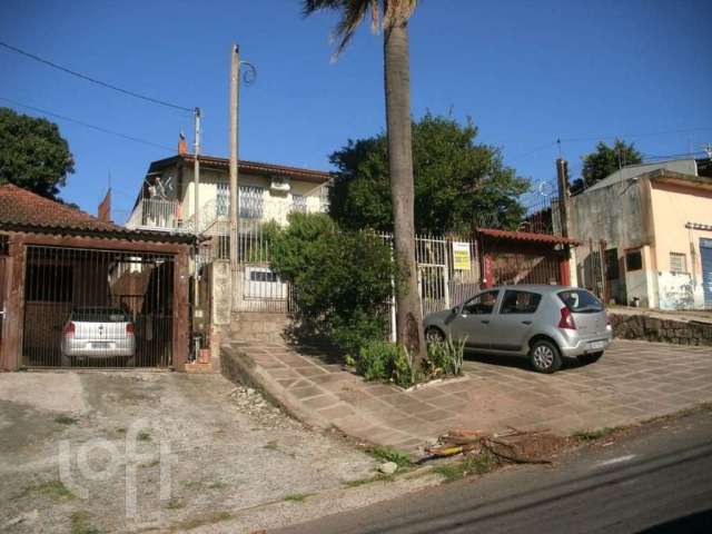 Casa com 3 quartos à venda na Avenida Paulo Pontes, 628, Cavalhada, Porto Alegre, 310 m2 por R$ 490.000