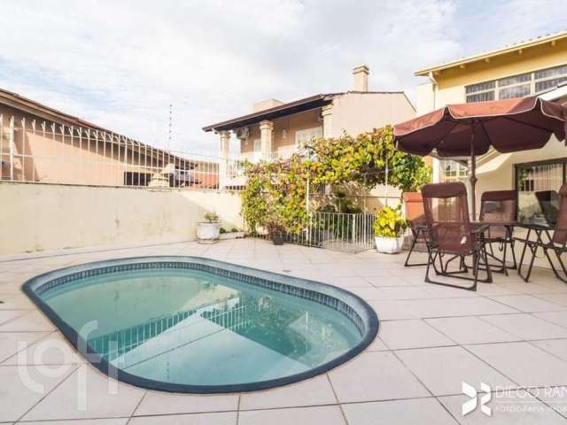 Casa com 3 quartos à venda na Estrada Vila Maria, 75, Cavalhada, Porto Alegre, 229 m2 por R$ 855.000