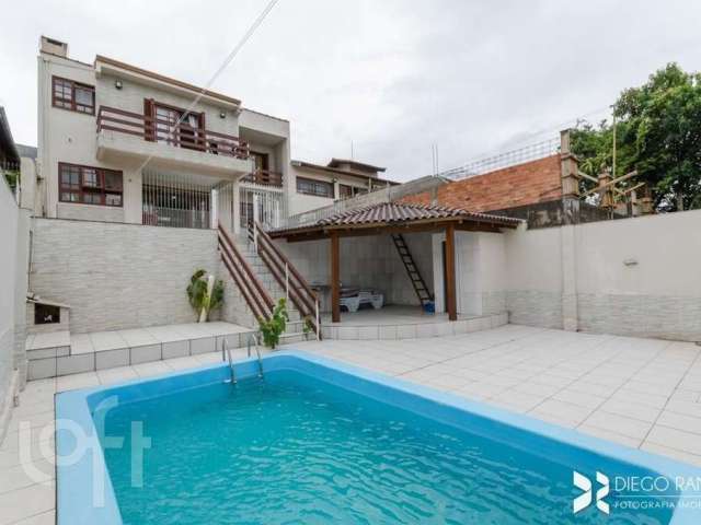 Casa com 4 quartos à venda na Rua Paul Harris, 130, Jardim Itu Sabará, Porto Alegre, 245 m2 por R$ 1.450.000