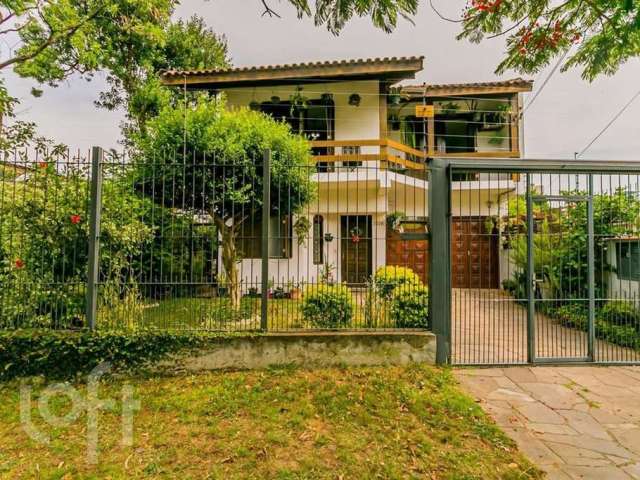 Casa com 4 quartos à venda na Rua Souza Lobo, 1210, Vila Jardim, Porto Alegre, 322 m2 por R$ 1.429.940