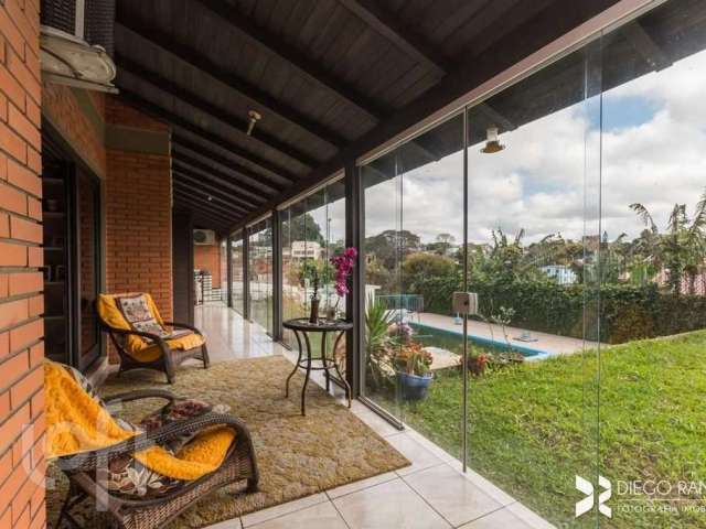 Casa com 4 quartos à venda na Rua Aluízio de Azevedo, 20, Jardim Itu Sabará, Porto Alegre, 540 m2 por R$ 2.775.000