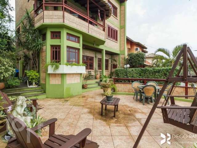 Casa com 3 quartos à venda na Rua Imeram Teixeira Cabeleira, 25, Ipanema, Porto Alegre, 267 m2 por R$ 1.050.000