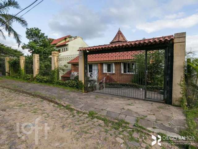 Casa com 3 quartos à venda na Rua Fernando Osório, 1869, Teresópolis, Porto Alegre, 256 m2 por R$ 850.000