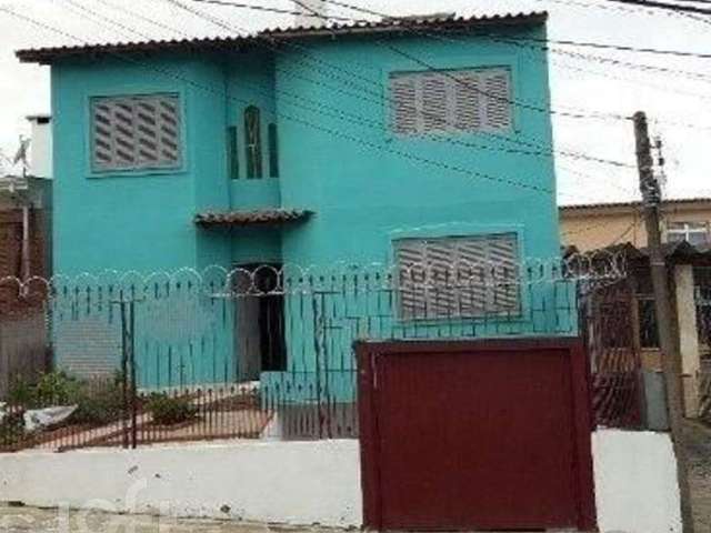 Casa com 4 quartos à venda na Avenida Delmar Rocha Barbosa, 729, Rubem Berta, Porto Alegre, 220 m2 por R$ 530.000