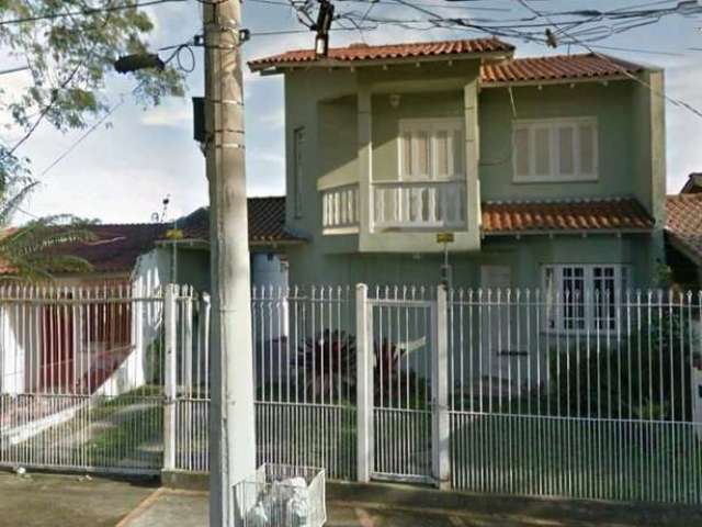 Casa com 3 quartos à venda na Rua Francisco Mattos Terres, 385, Hípica, Porto Alegre, 197 m2 por R$ 712.500