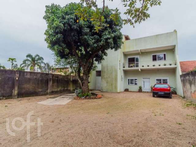 Casa com 3 quartos à venda na Rua Jerolomo Minuzo, 464, Vila Nova, Porto Alegre, 331 m2 por R$ 859.750