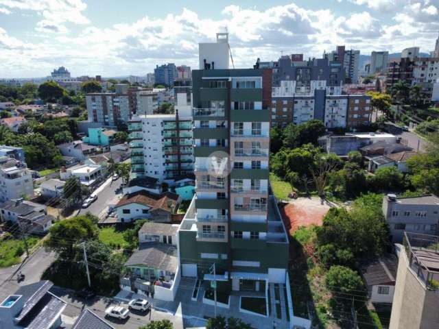 Apartamento 2 dormitórios com suíte e 2 vagas de garagem.