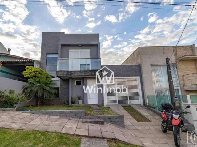 Casa com 3 dormitórios à venda, 134 m² por R$ 960.000,00 - Alto Petrópolis - Porto Alegre/RS