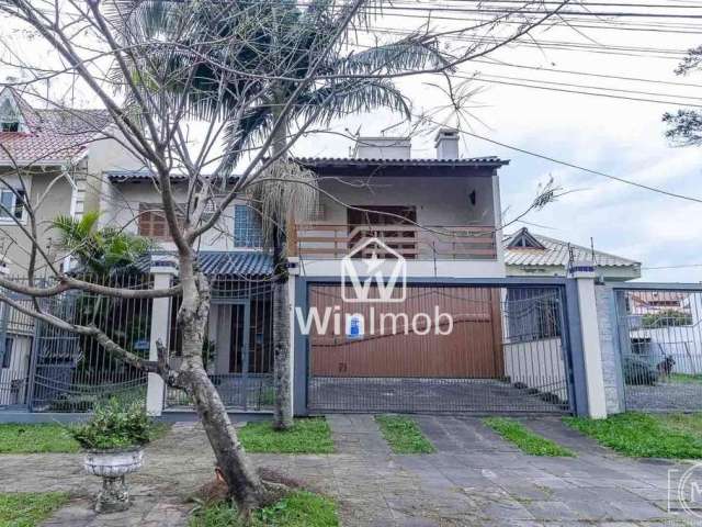 Casa com 3 dormitórios à venda, 275 m² por R$ 950.000,00 - Santa Fé - Porto Alegre/RS