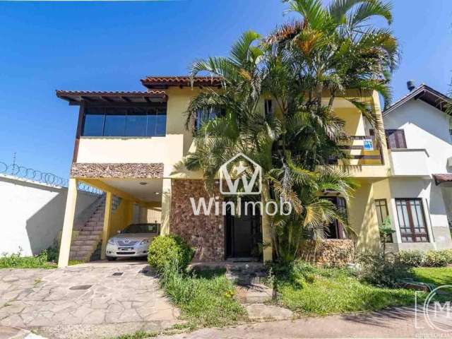 Casa com 3 dormitórios à venda, 174 m² por R$ 990.000,00 - Ecoville - Porto Alegre/RS