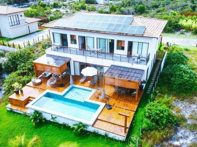 CASA A VENDA EM PRAIA DO FORTE, LITORAL NORTE DA BAHIA - Condomínio Praia Bella, acesso direto à praia, 5 suítes de alto padrão porteira fechada.