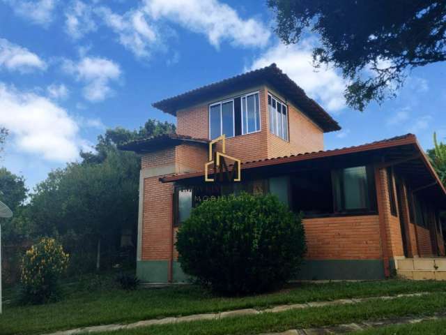 Casa em condomínio a venda com 3 quartos sendo 2 suítes terreno de 1300m² em Igarapé MG.