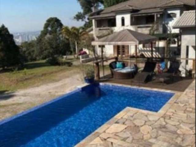 Sítio residencial à venda na Serra do Itapeti com 300 m² e 7.000 m² de área, 4 quartos, 1suíte, piscina, canil, quadra, churrasqueira e fogão a lenha