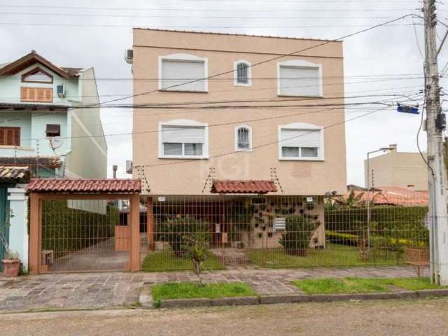 Excelente apartamento, bem iluminado com peças amplas, Living 2 ambientes com lareira, 2 dormitórios, gabinete mobiliado, 2 banheiros social, cozinha, área de serviço. Apartamento ensolarado,  somente